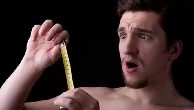 the man measured his penis before the enlargement